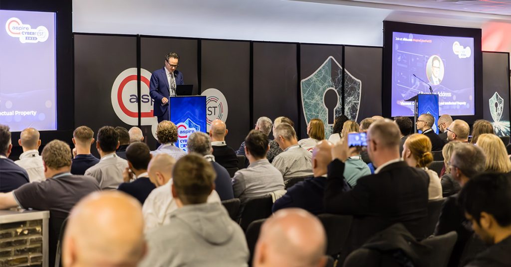 A photograph of Viscount Camrose speaking at Aspire CyberFest, held at St James’ Park on 26 September 2023