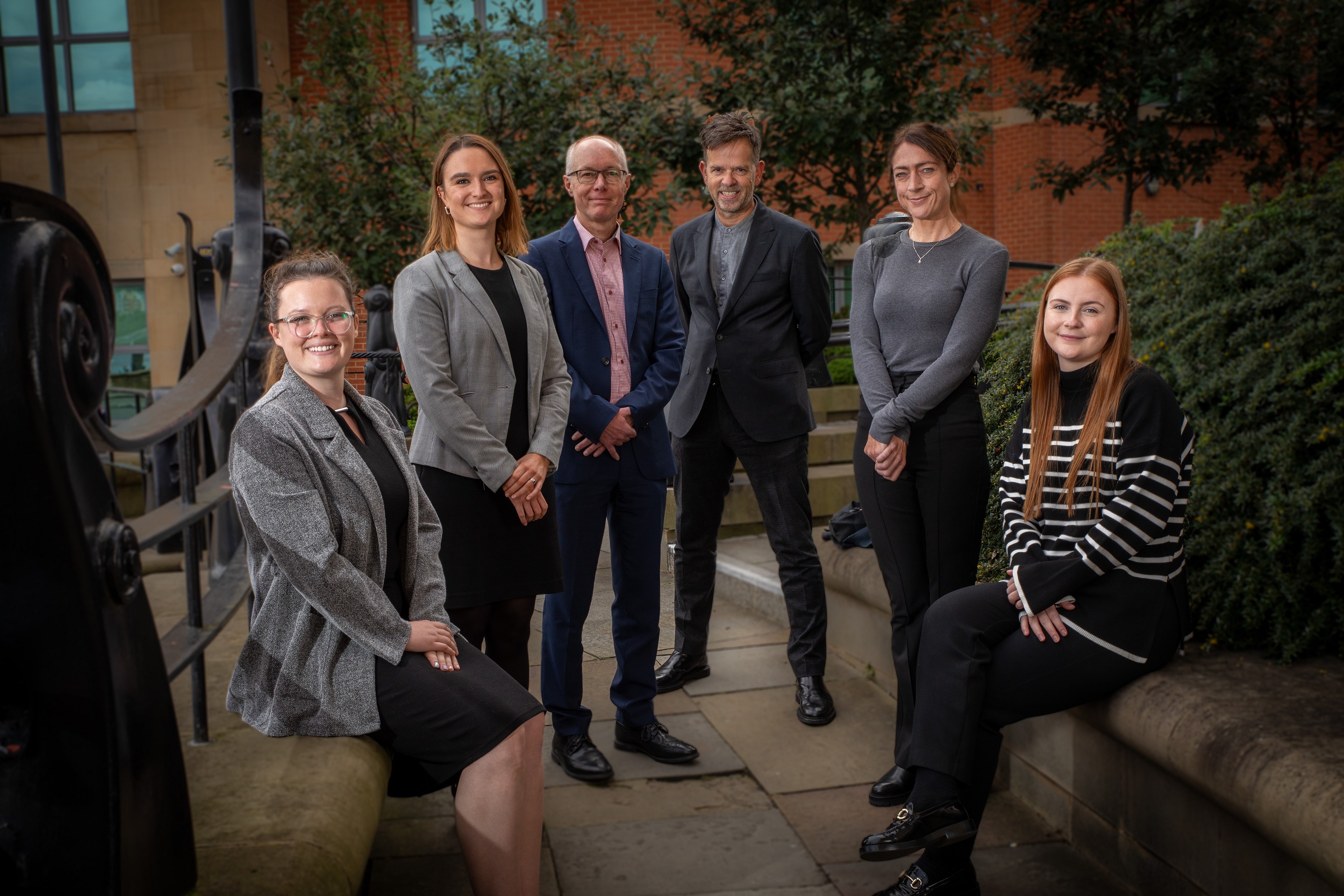 Ward Hadaway’s social housing team in the North East smiling at the camera. Pictured left to right are: Tyla, Naoise, Robert, John, Julia and Chloe.