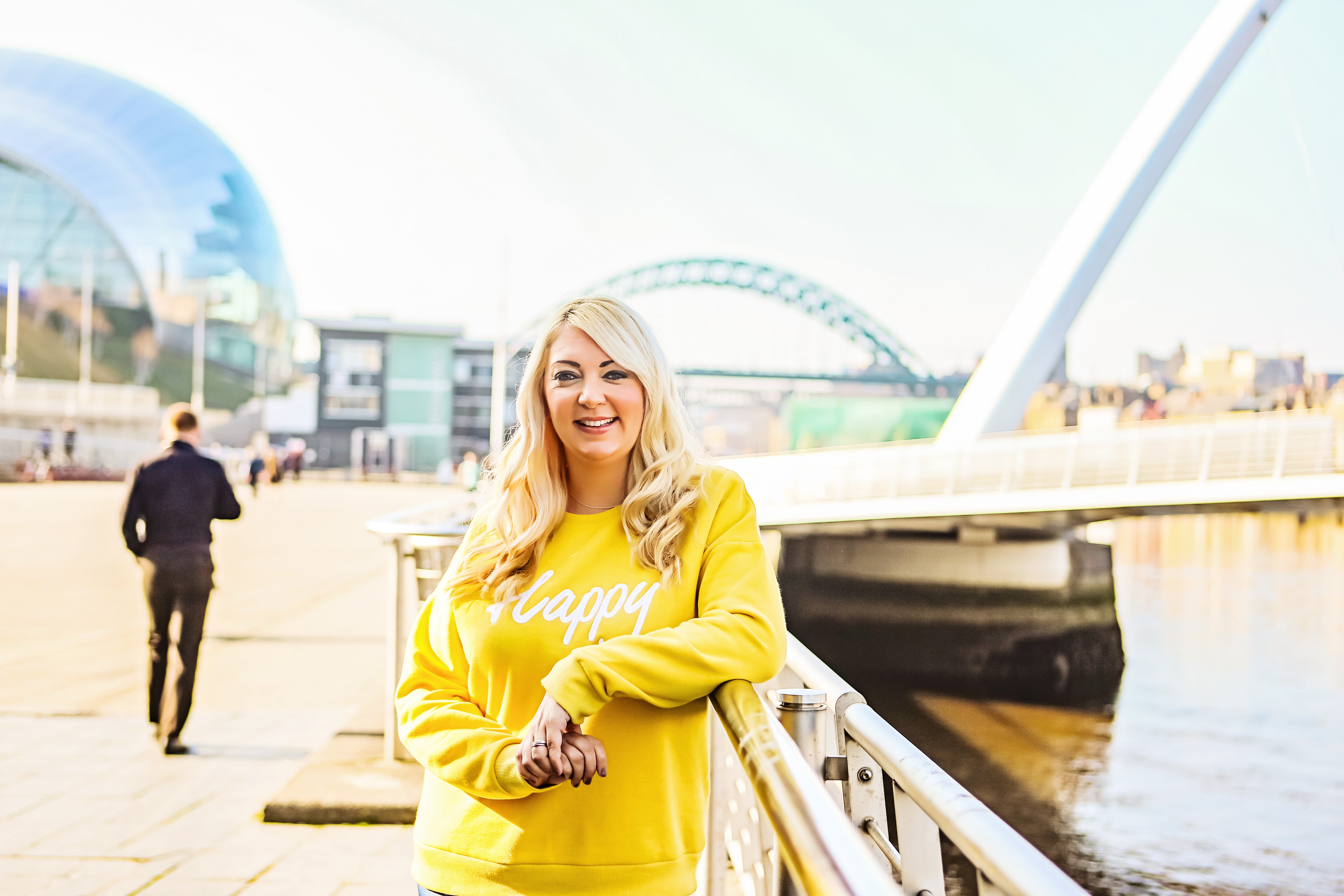 Amy Whitfield standing in front of the Millennium Bridge.