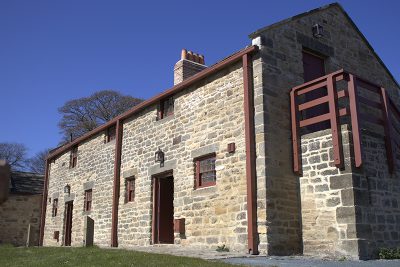 Georgian-style brick cottage.