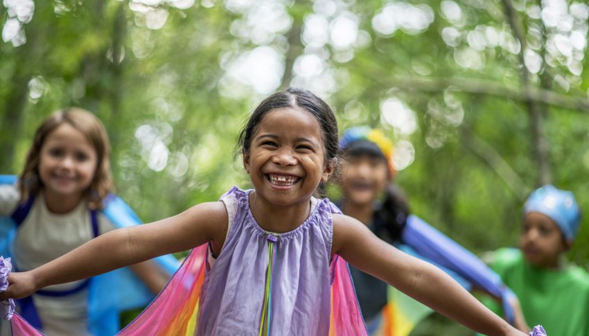 Children playing in the forest at Dragonfly Festival