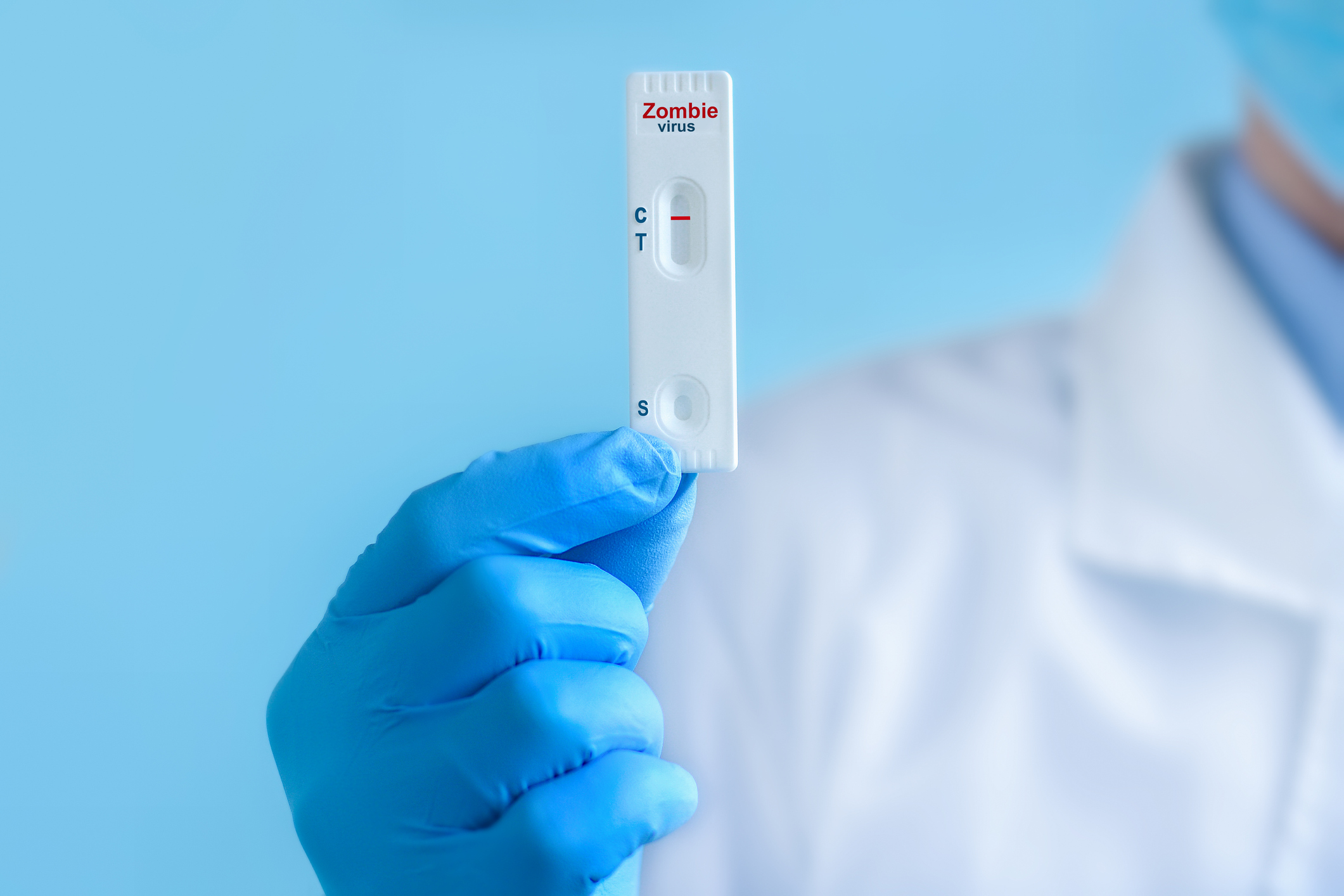 Scientist holding up Zombie test