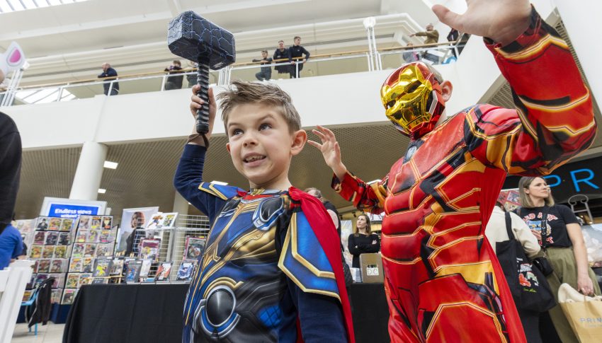Two children dressed up as superheroes in Metrocentre