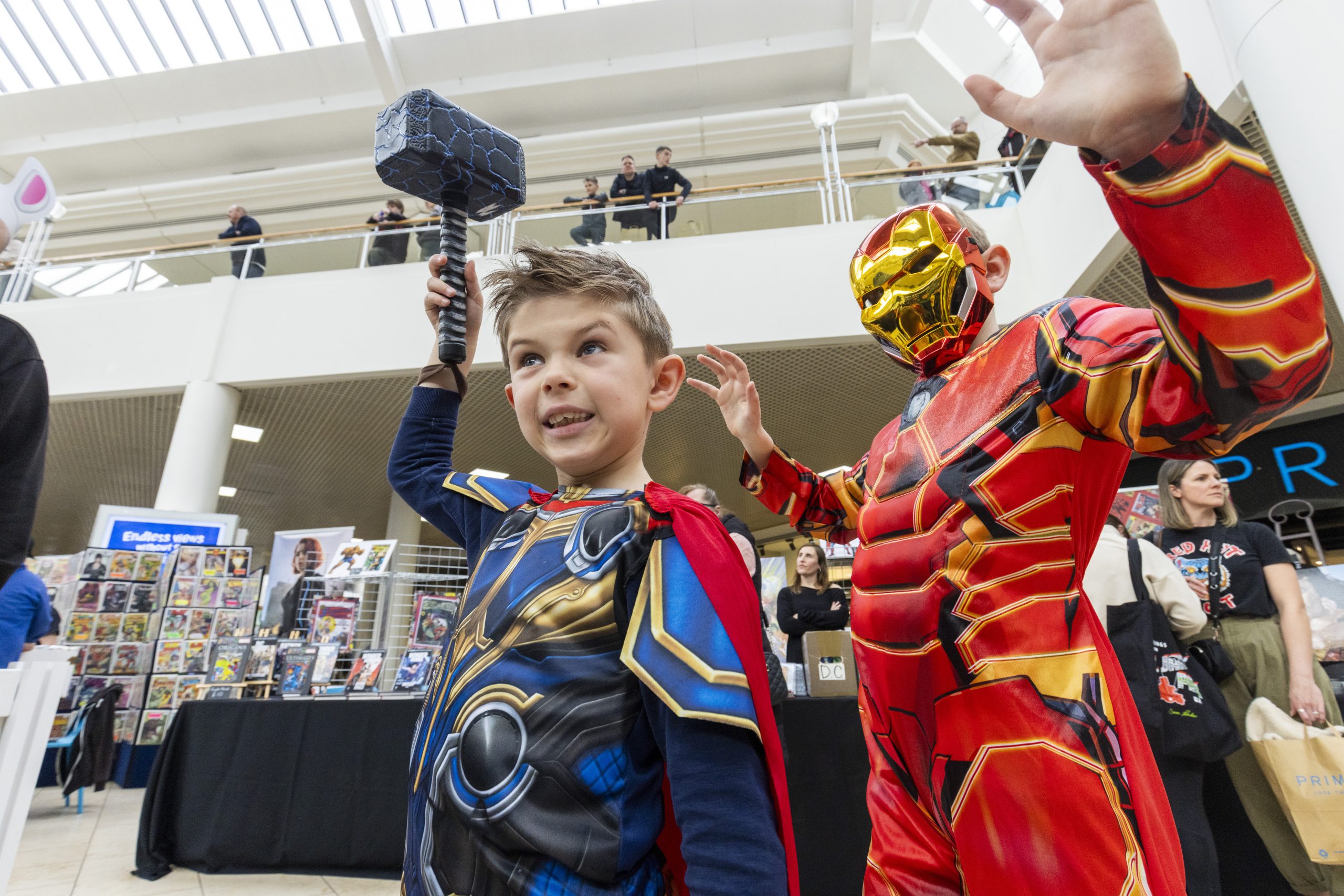 Two children dressed up as superheroes in Metrocentre
