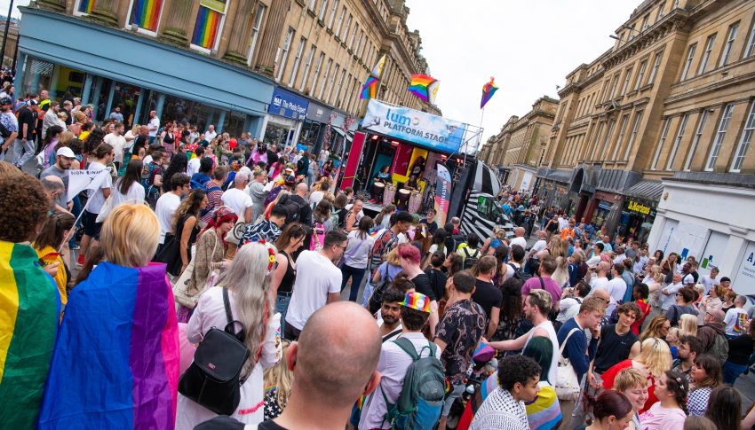 A crowd gathered around a stage during Pride in Newcastle