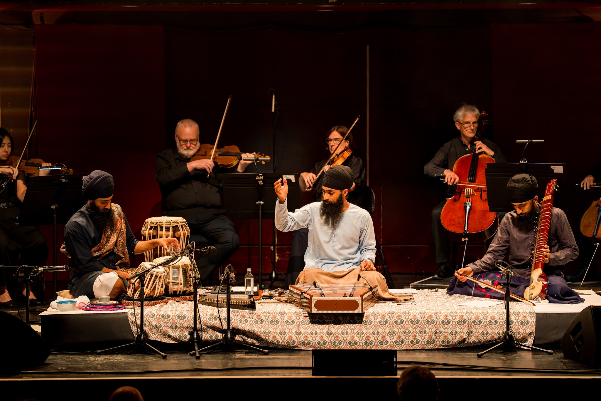 Musical performers performing on stage
