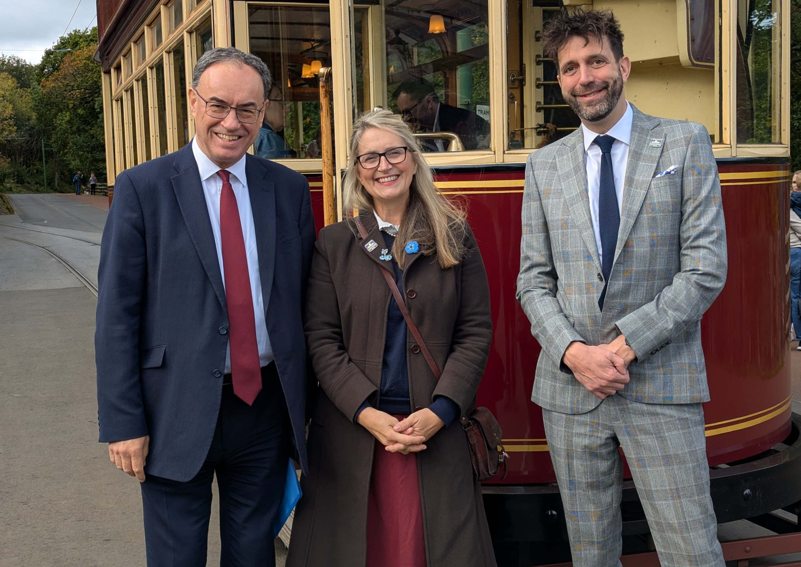 Beamish CEO and Chair with Bank of England Governor in front of Beamish tram.