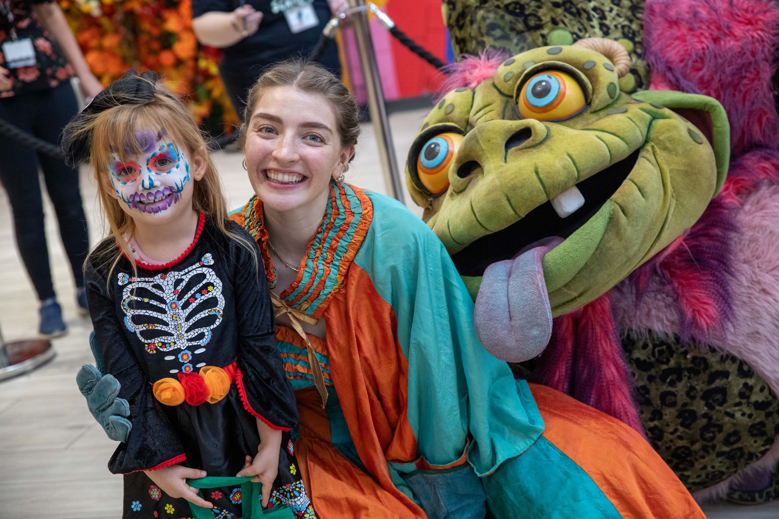 Child and adult dressed in Halloween character costumes