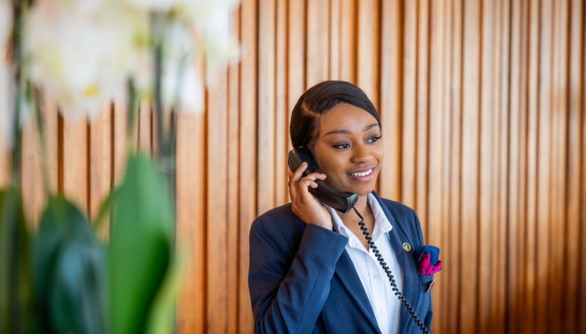 Receptionist on the phone.