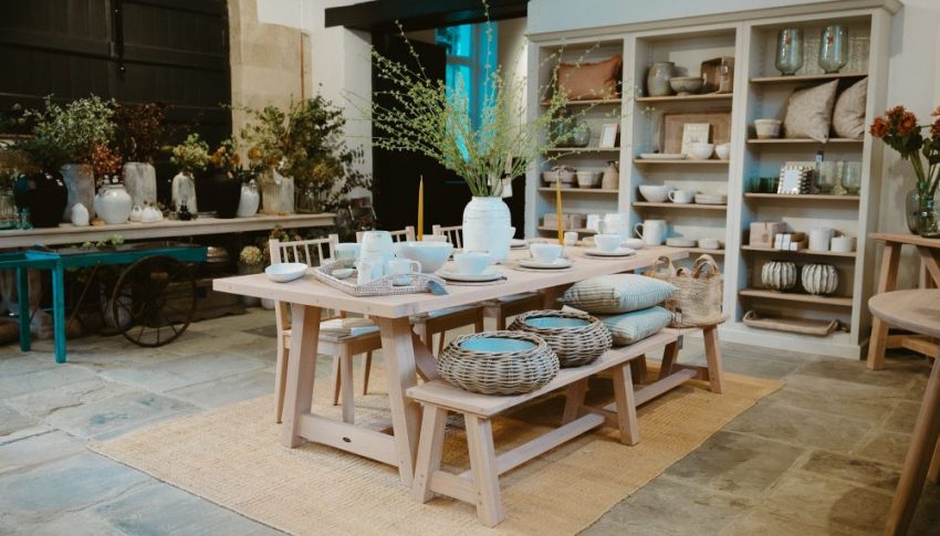 Display set for homeware in a rustic looking room.