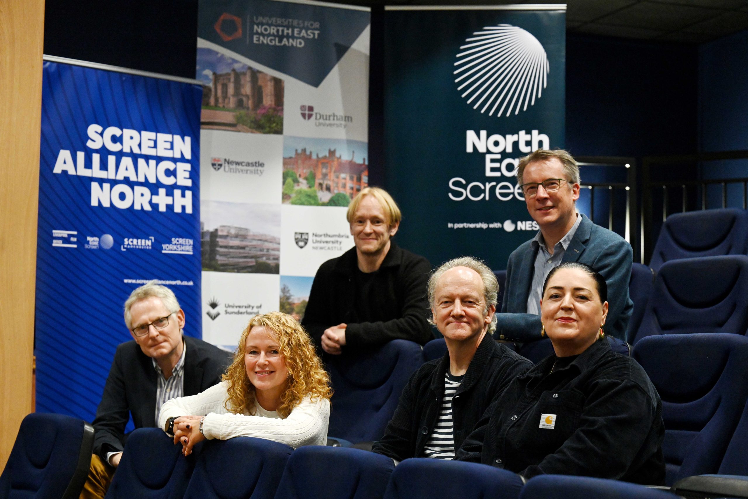 North East Universities Screen Network representatives sat together on cinema seats.