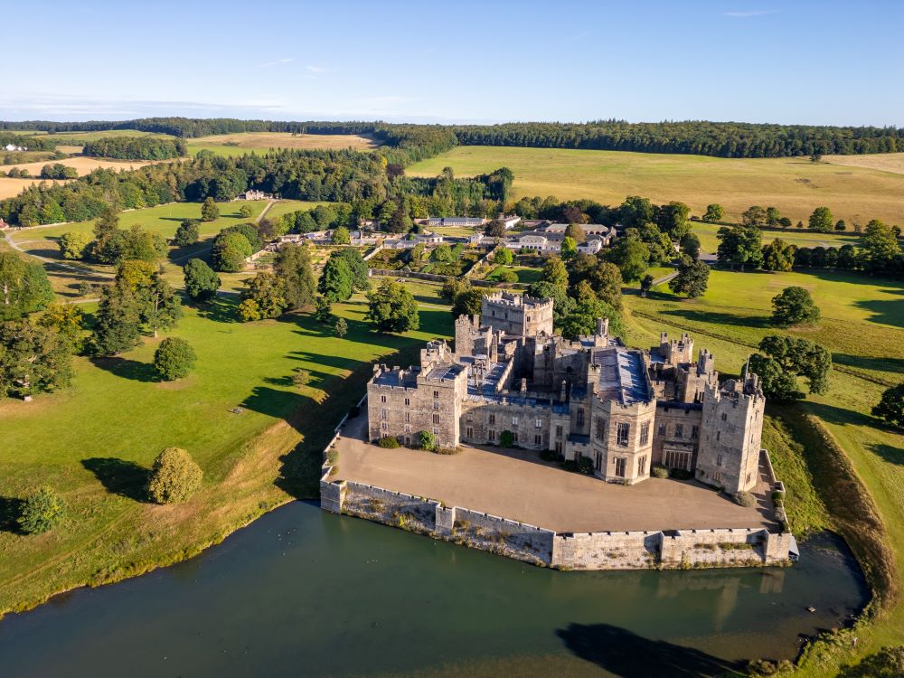Aerial view of Raby Castle and the surrounding fields and trees.