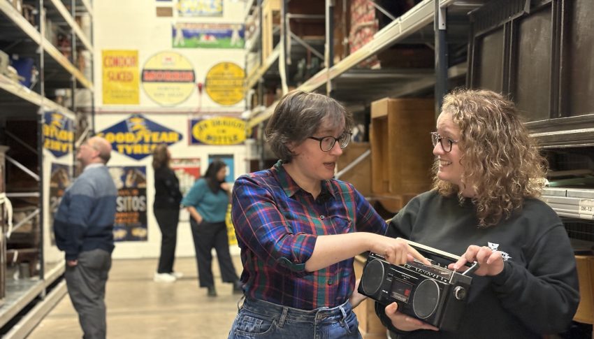Beamish, The Living Museum of the North collections - a pair of people looking at an artefact.