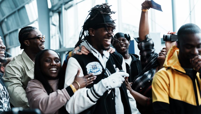 A group of people dancing at MOBO Fringe Festival