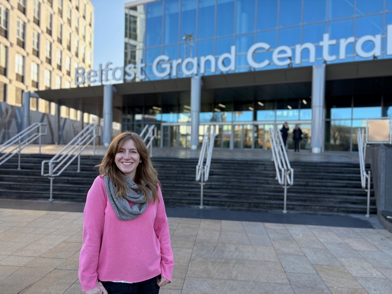Person in pink jumper from Beaconhouse.